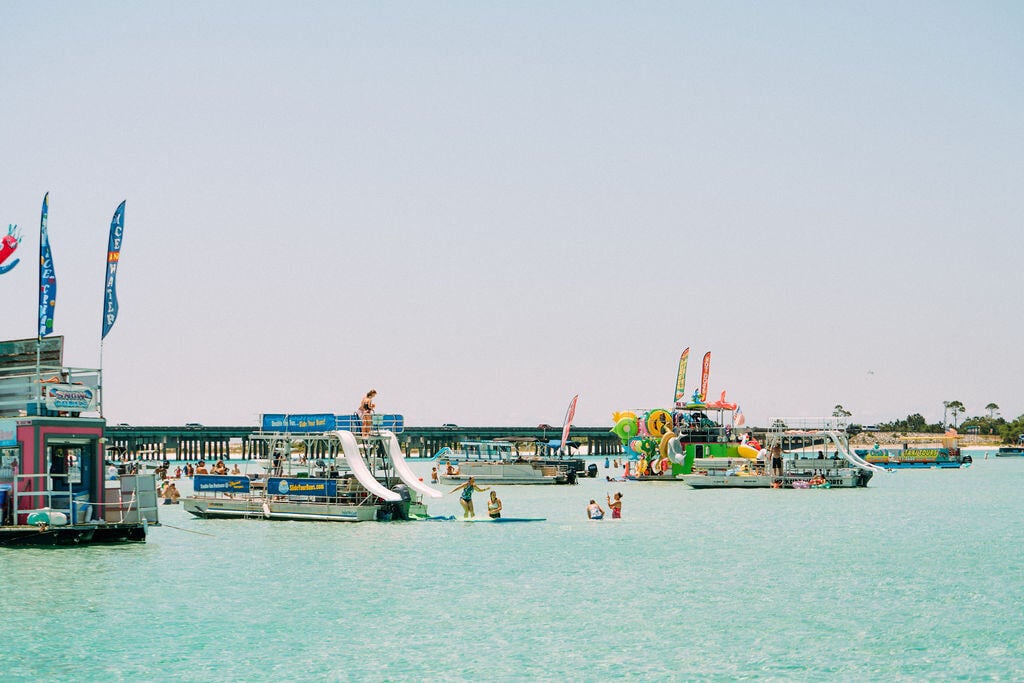 double decker pontoon boat anchored at crab island in Destin, FL